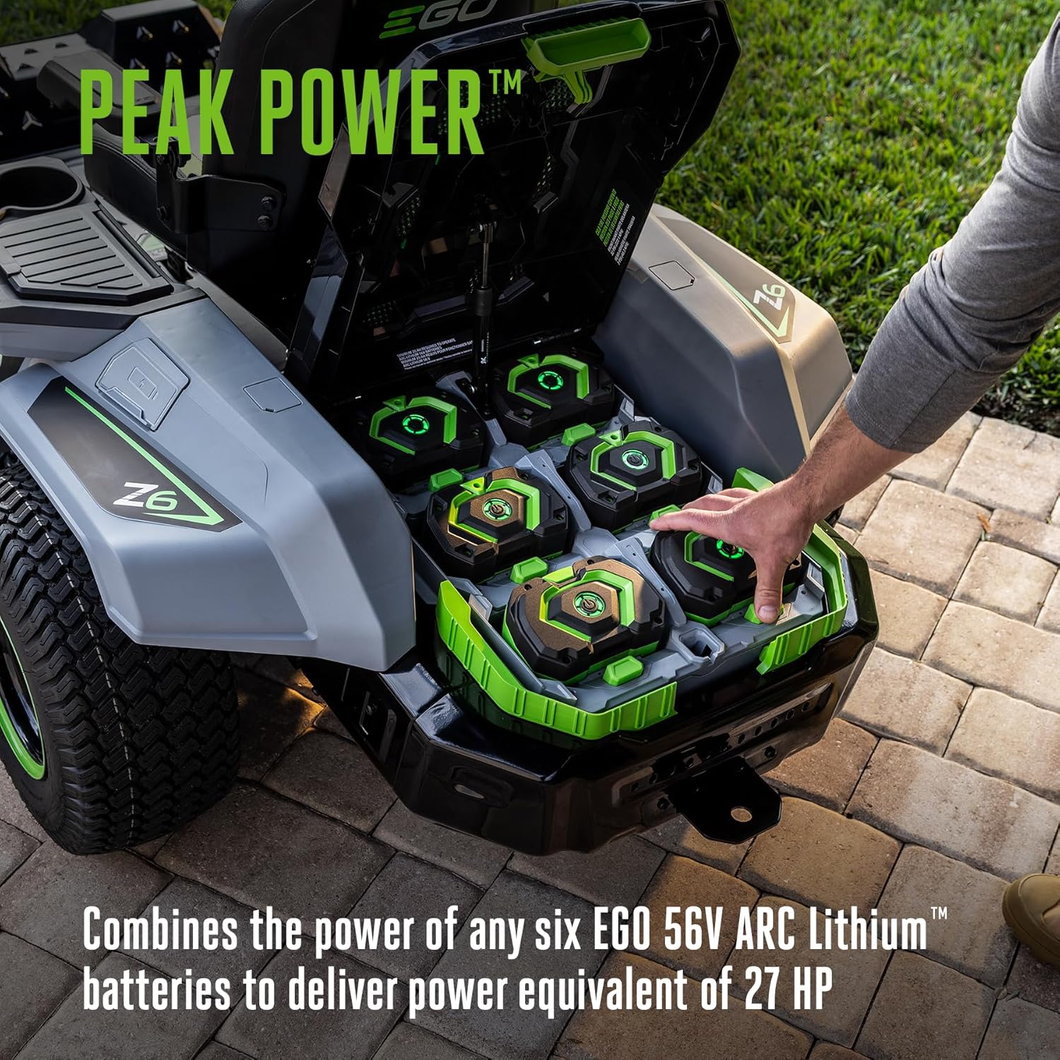EGO Z6 zero turn riding mower review unboxing showing six 10.0Ah batteries, charger, and steering wheel